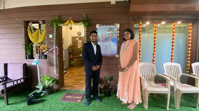 Dr. Nitin and team member at the clinic entrance